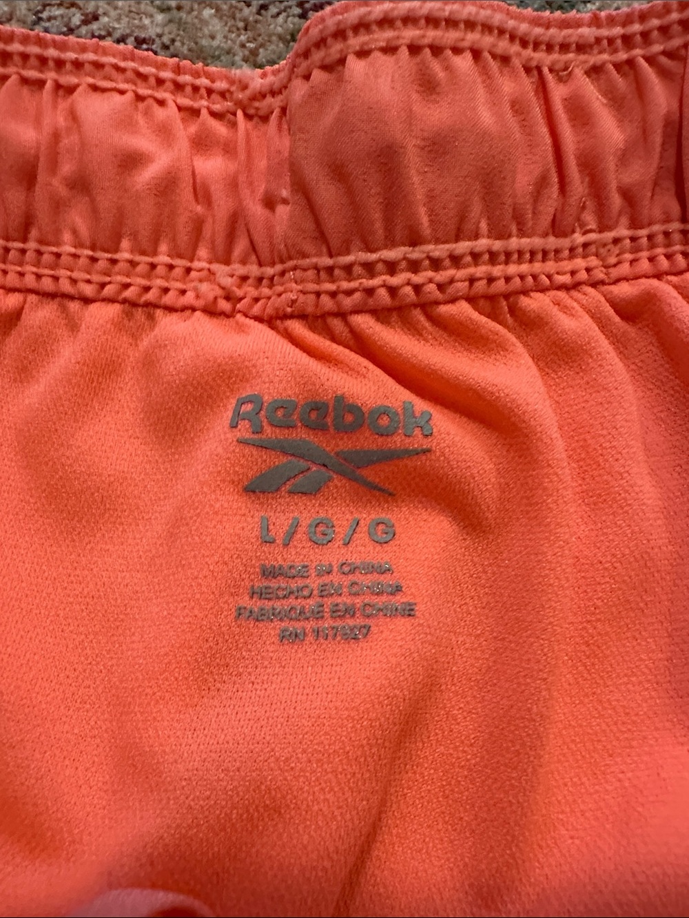 Reebok Women's Coral-Orange Athletic Shorts with Black Trim - Picture 3 of 6